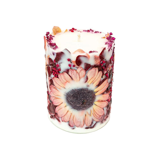 Handmade autumn botanical soy wax candle featuring a dried Gerbera, hydrangea and natural burgundy botanicals.