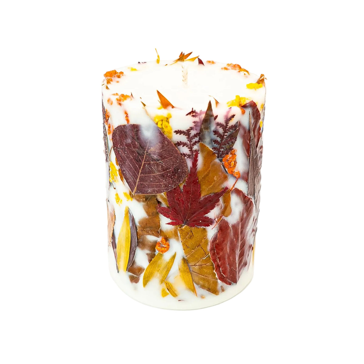 Blossoms of Eden autumn botanical candle showing dried red and burgundy leaves with golden flowers around a cream soy wax pillar.