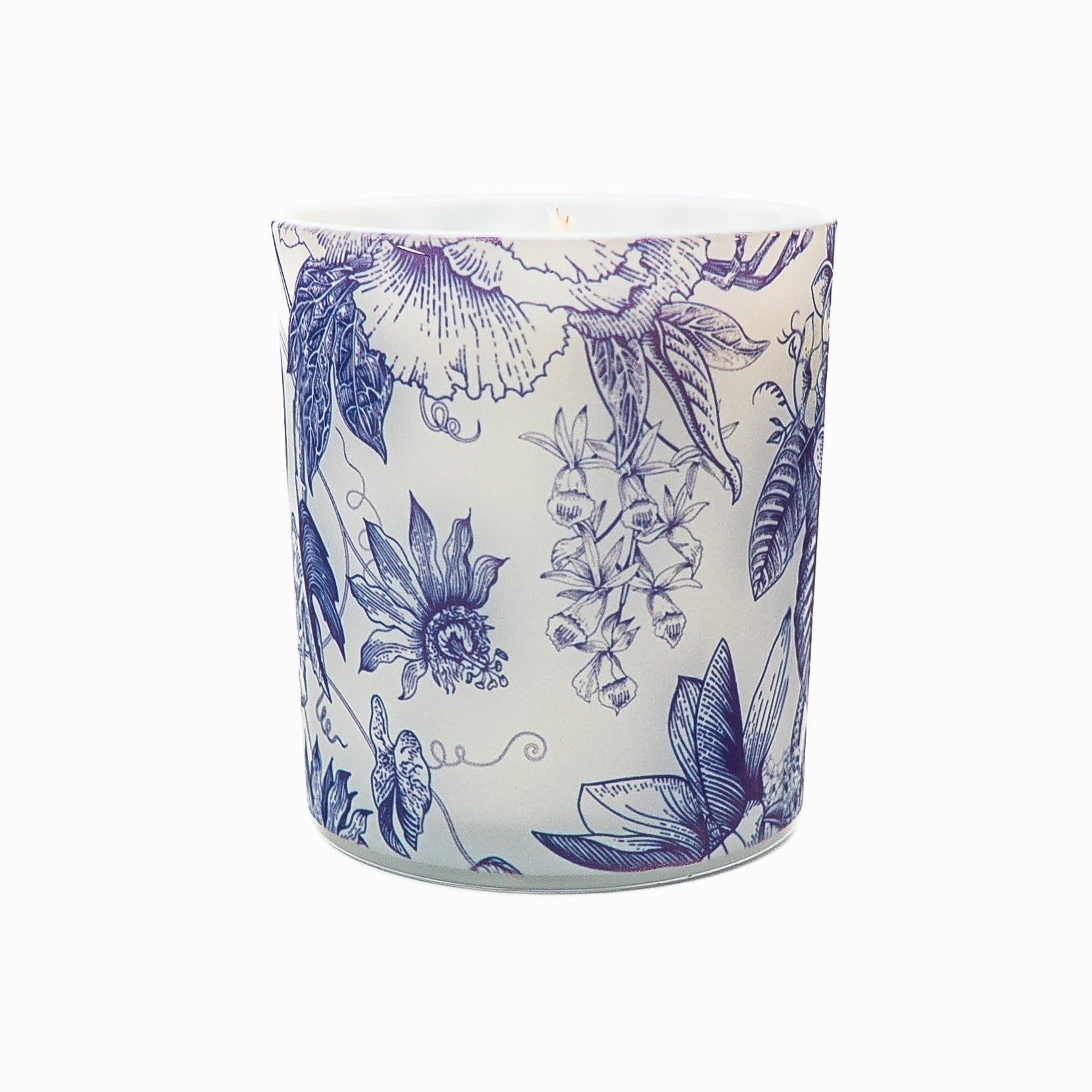Handmade soy wax candle in a frosted glass jar with blue botanical illustrations and natural bamboo lid.