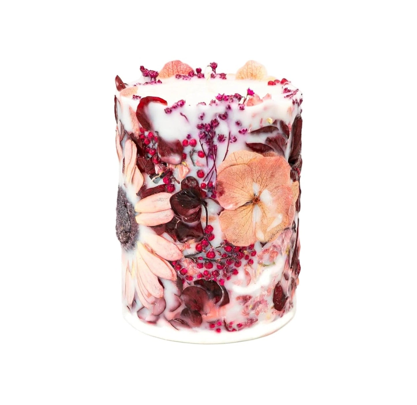 Handmade botanical soy wax pillar candle with a cotton wick and dried botanical details.
