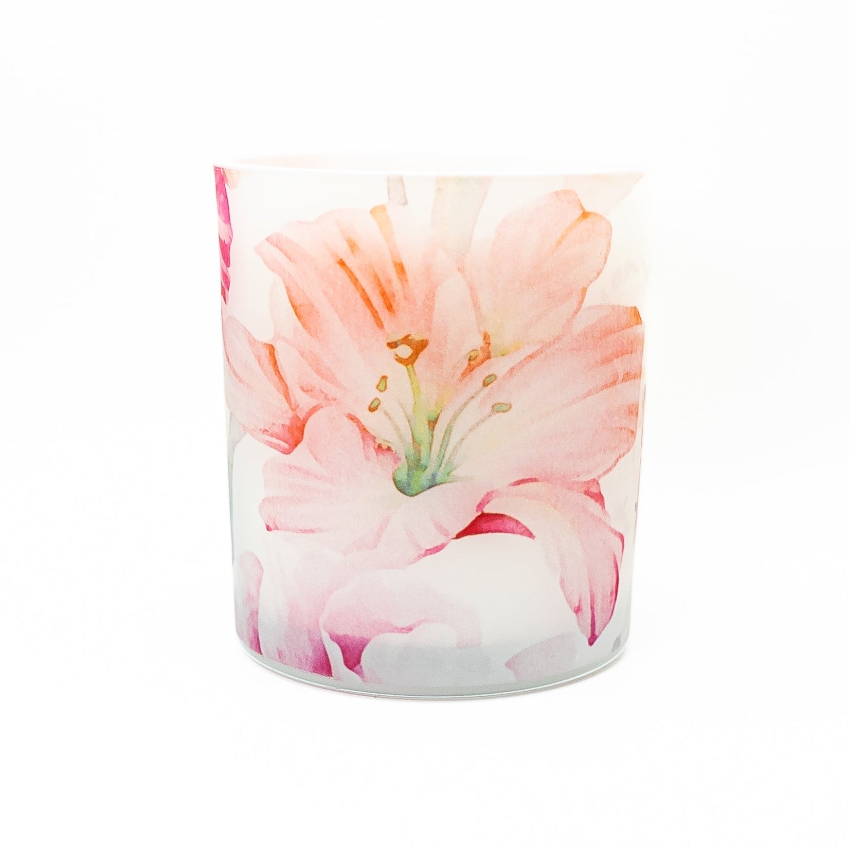 Soy wax candle in a decorative glass jar with bright watercolour floral pattern and bamboo lid.