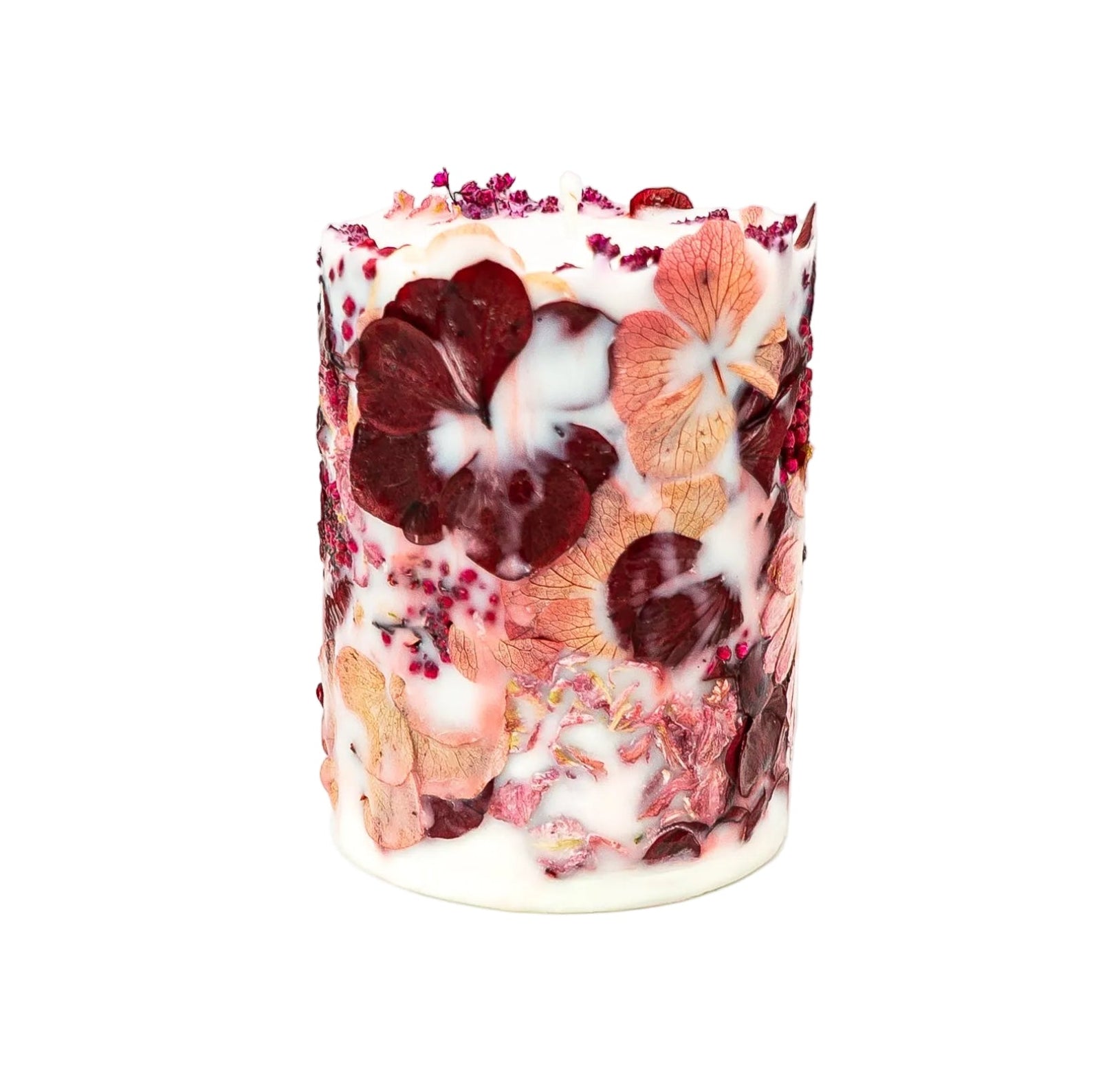 Handmade botanical soy wax pillar candle with embedded dried flowers, hydrangea and burgundy botanicals.