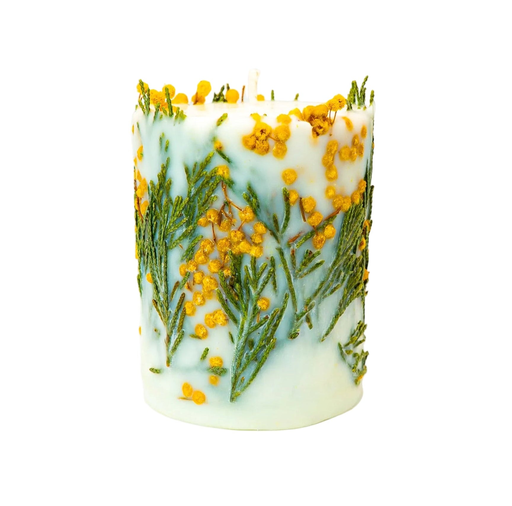 Botanical candle decorated with yellow mimosa flowers and green foliage on a white background