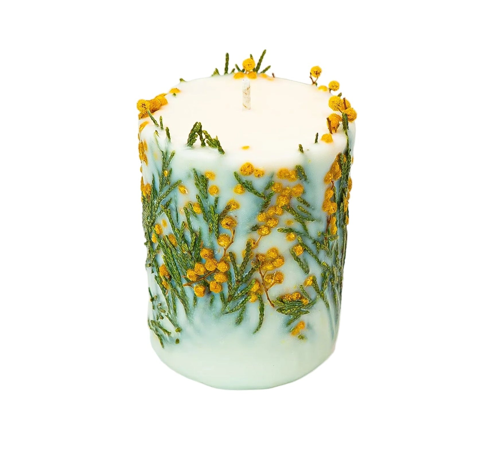 Handmade botanical soy wax candle decorated with yellow mimosa blooms and fresh green fern foliage