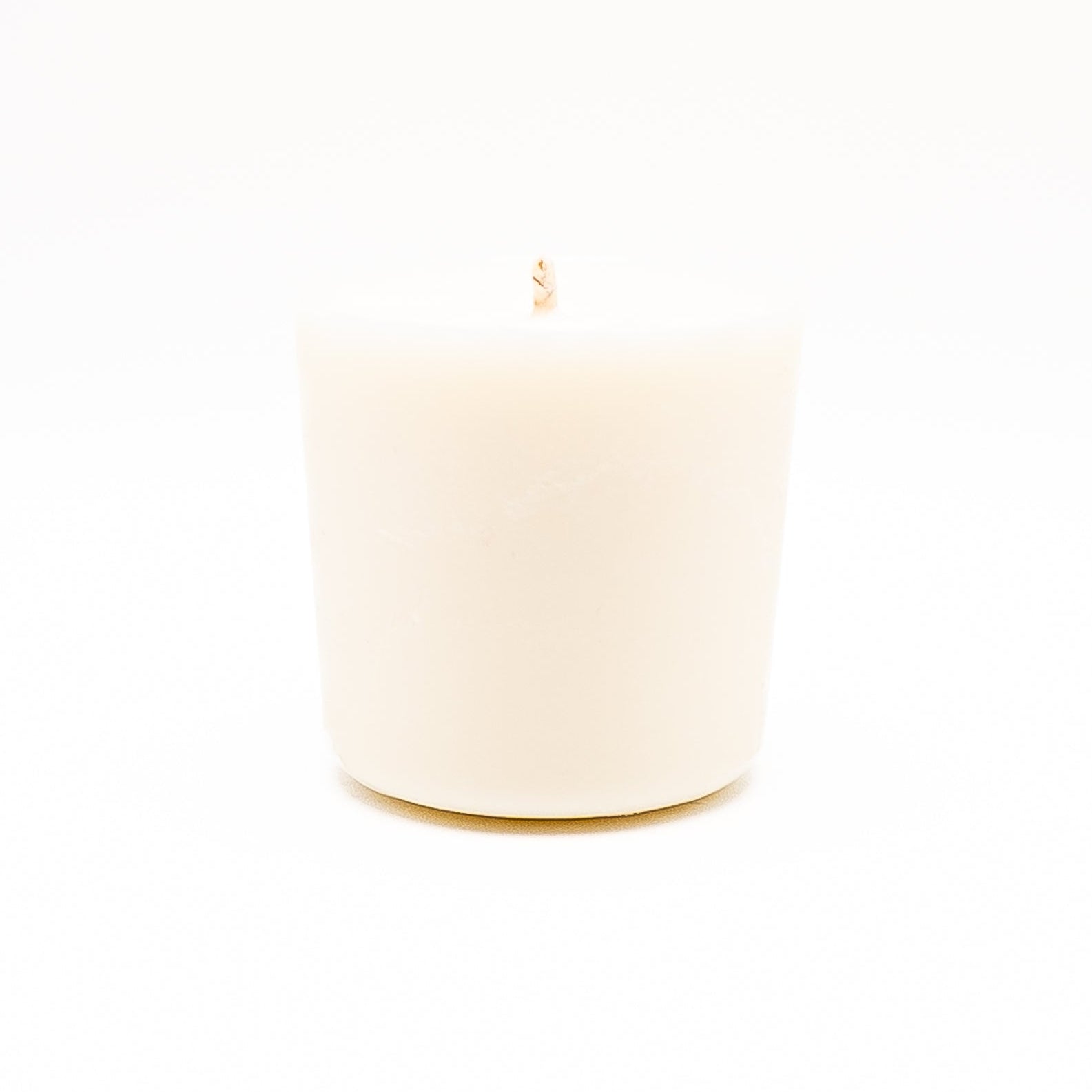 Hand-poured soy wax candle refill designed for botanical glass candle jars.