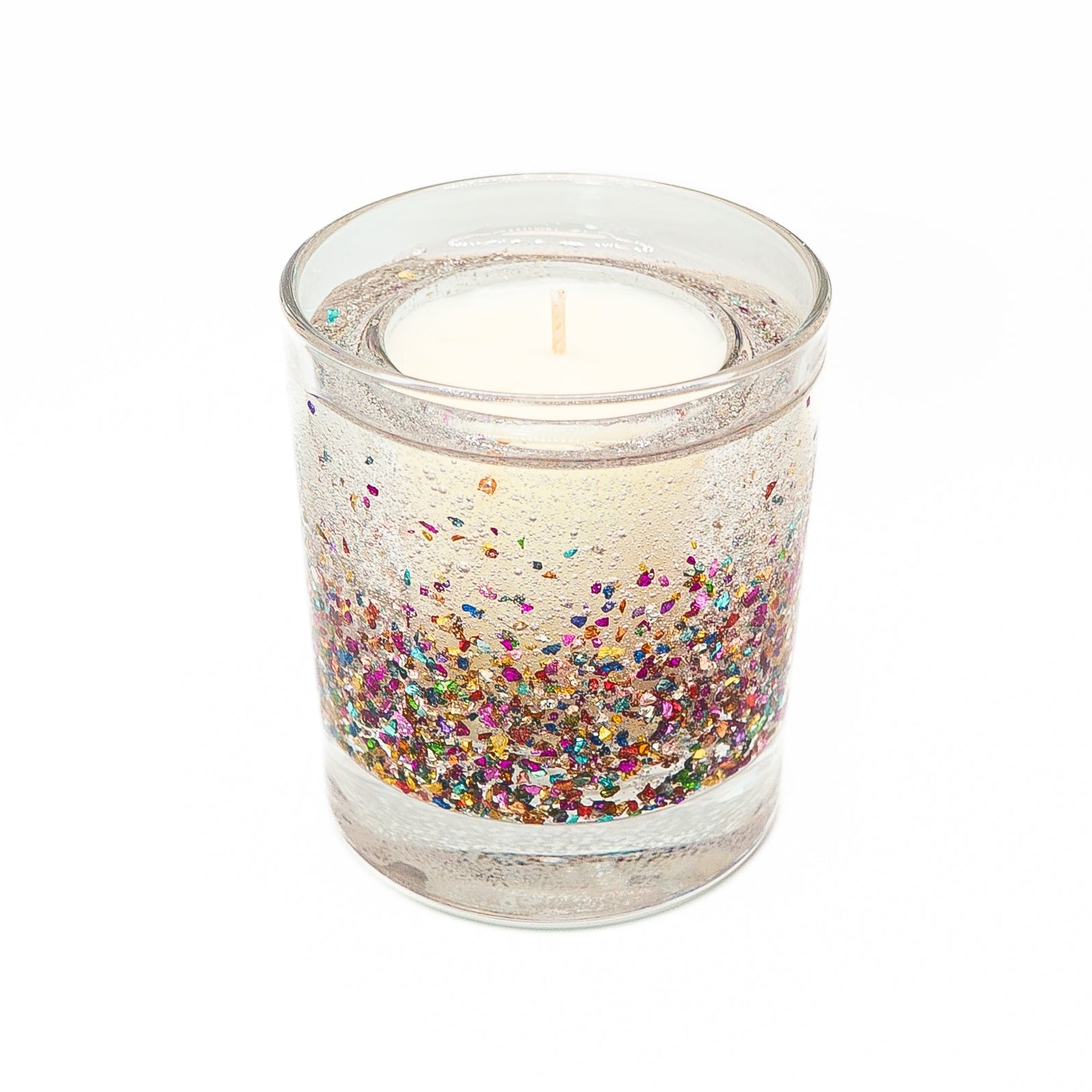 Sparkling gel wax candle with colourful glitter in a clear glass jar and soy wax center.