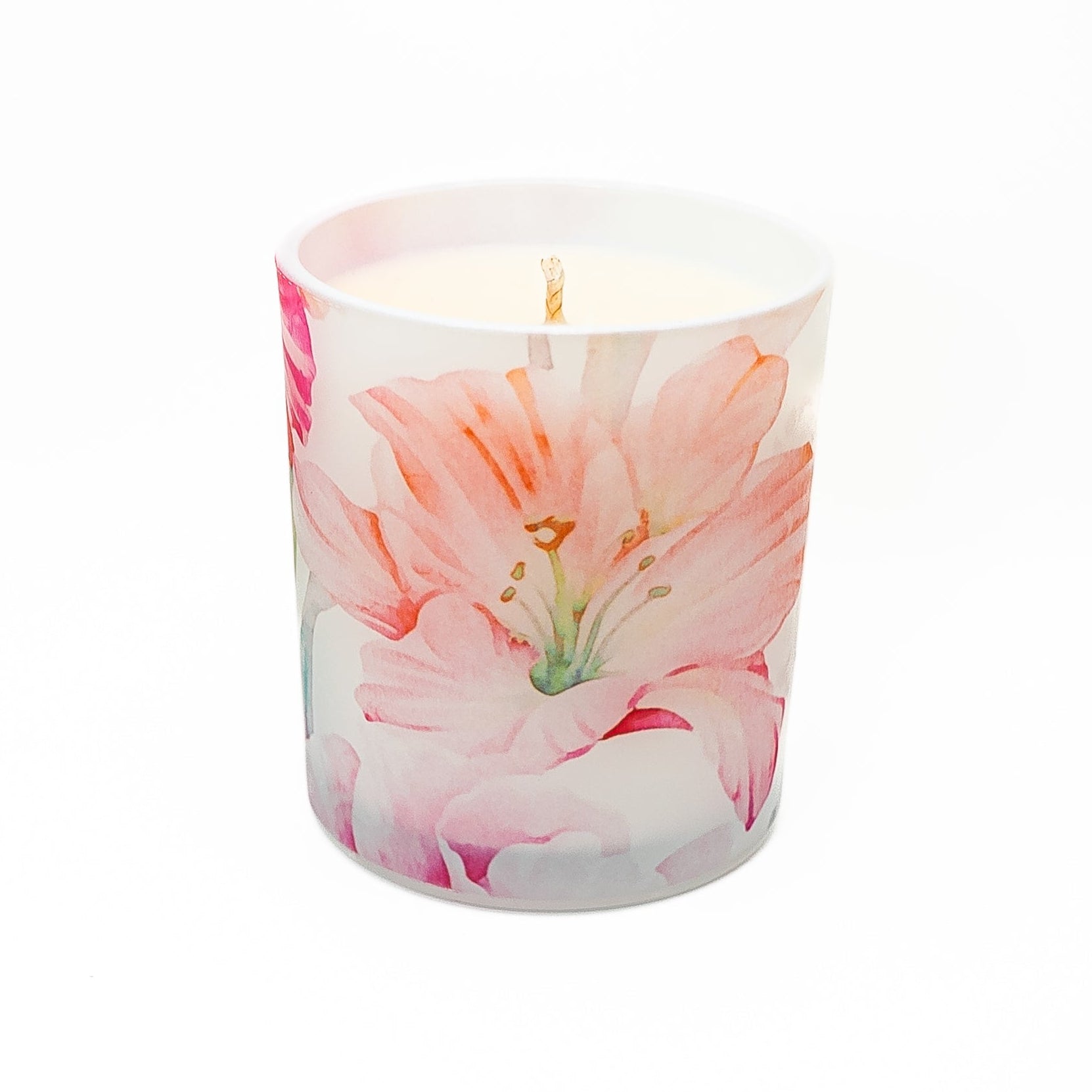 Decorative soy wax candle in a frosted glass jar featuring colourful watercolour flower illustrations.
