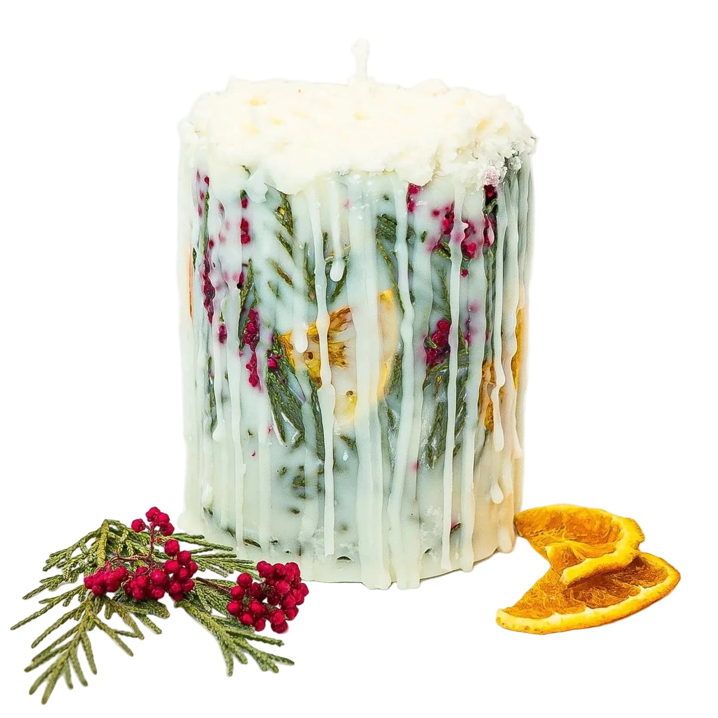 Hand-poured soy wax botanical pillar candle with dried orange slices, evergreen leaves, and red berries.